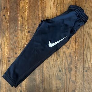 Nike Black Kids Jogger Pants with Silver Swoosh